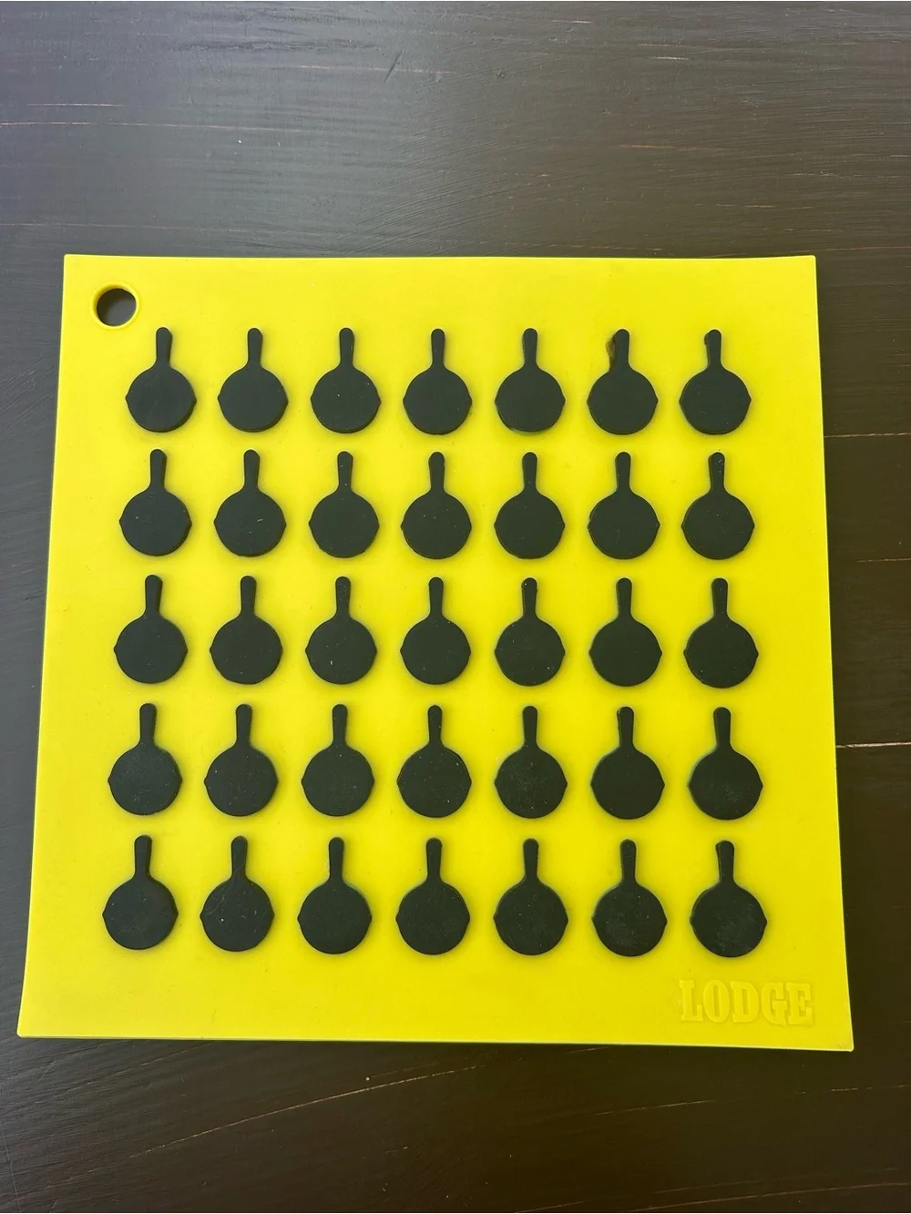 Lodge Yellow Silicone Trivet with Black Skillet Pattern